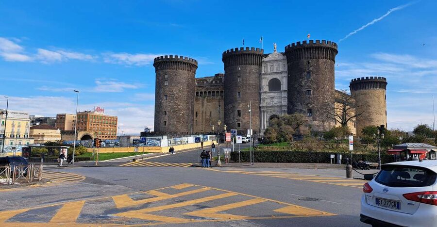 Bourbon Naples: Exclusive guide and Royal Palace pass - Municipio Square to Castel Nuovo, power in stone