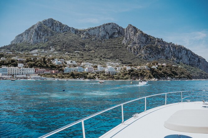 Capri Luxury Private Boat Tour from Capri or Napoli - Sailing Capri’s signature stops: Faraglioni, Marina Piccola, and Tiberius’ Leap
