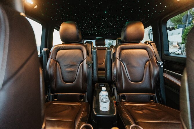 Exclusive One-Way Transfer from Napoli to the Amalfi Coast Area - The 90-minute Mercedes ride: Wi-Fi, water, and chilled prosecco