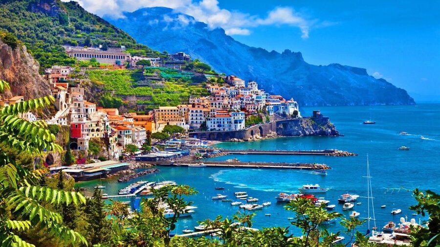 From Naples: Amalfi Coast by Car & Boat plus Emerald Grotto - Sorrento in the afternoon: shops, taverns, and sea views