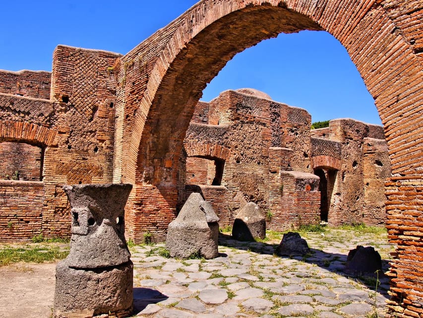 From Naples: Herculaneum and Pompeii Day Trip with Tickets - Pompeii’s big sights: amphitheater, victim casts, and decorated villas