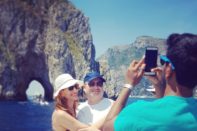 Full day Capri Island Small Group Boat Tour from Naples - Food and drinks on board: snacks, prosecco, and limoncello tasting