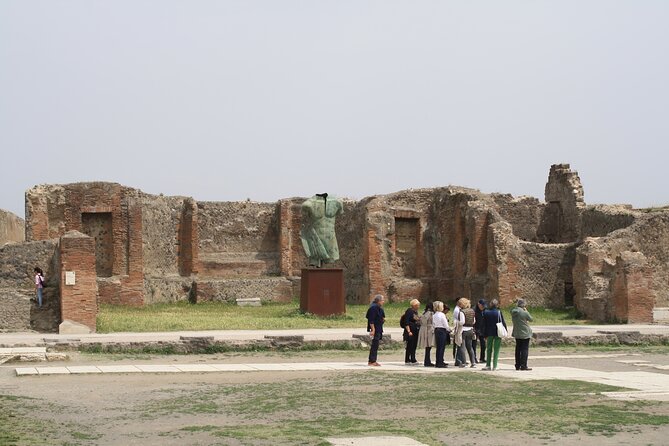 Half-Day Exclusive Private Tour of Pompeii and Herculaneum - Entering Pompeii: Forum Life, Sewage Systems, and Shops