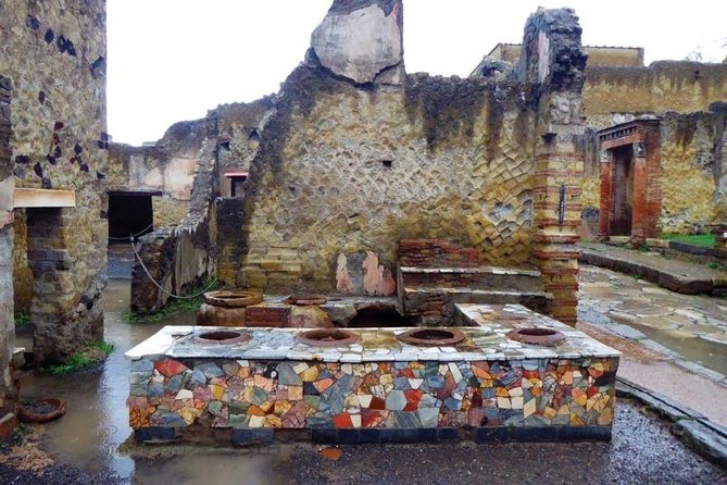 Herculaneum Private Tour with an Expert Archaeologist - The ancient beach and boat sheds: a heavy stop, handled thoughtfully