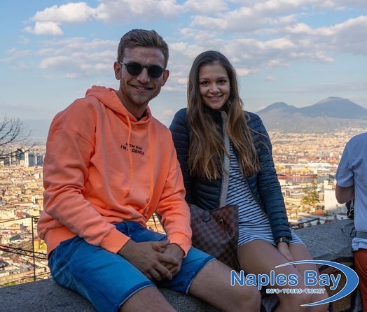 Naples Panoramic Walking Tour: From the Hills to the Center - Naples’ long street and rooftop views over the gulf