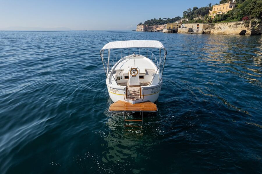 Naples Paradise Boat Tour with Swim, Music & Hidden Gems - Meeting at Via Francesco Caracciolo and stepping onto the boat