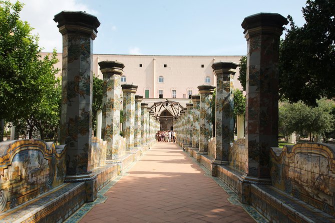 Naples: Saint Chiara Cloister and Velied Christ Guided Experience - Stop 1, Santa Chiara Cloister: tiled calm, garden quiet, and Franciscan context