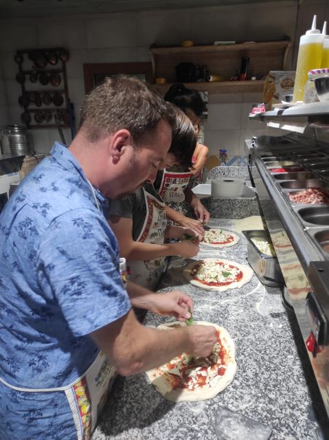 Naples: Small Group Pizza Making with Drink Included - Air-conditioned comfort inside a traditional pizzeria