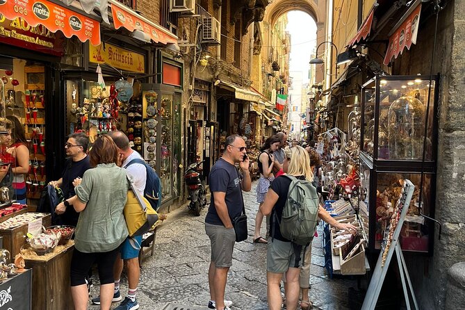 Naples Stress-Free Tour: Between Mystery, Legends & History - Pulcinella at the Busto: a photo, a laugh, and street-level Naples
