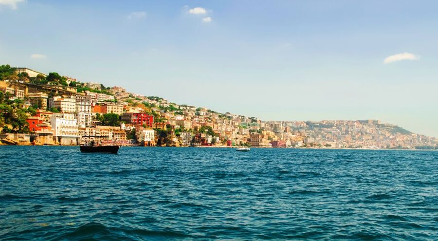 Naples: Sunset Cruise by boat with Aperol Spritz and Snacks - Posillipo promontory and Trentaremi Bay, where geology meets story