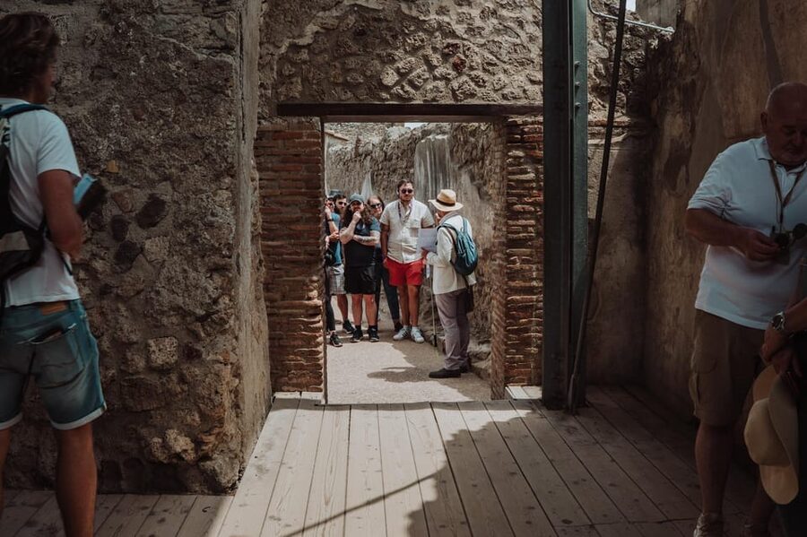 Pompeii: Entry Ticket and Guided Tour with an Archaeologist - Macellum and Forum Baths, Trade and Routine Beyond the Temples