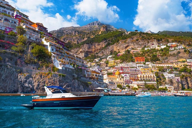 Positano & Amalfi Boat Tour from Naples with Light Lunch - First Boat Views, Sorrento Coastline, and Marina Grande