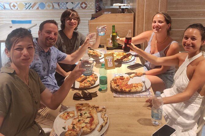 Semi-Private Pizza Making Experience in Naples with Drink - Baking and eating: your pizza plus the included drink