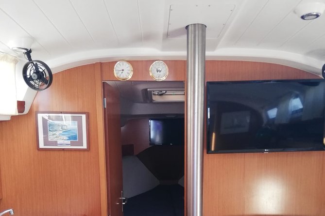 Sorrento Coast Sailing Experience. All Inclusive Sea Adventure - Steering the boat: the fun part that feels more personal than a sightseeing cruise