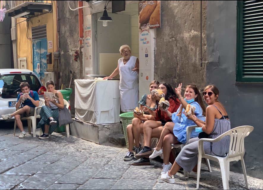 The Original Street Food & Market Tour of Naples - Maradona murals stop: beer and taralli in a very local setting